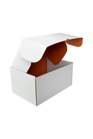 Caja de regalo Remanence abierta con interior en color naranja