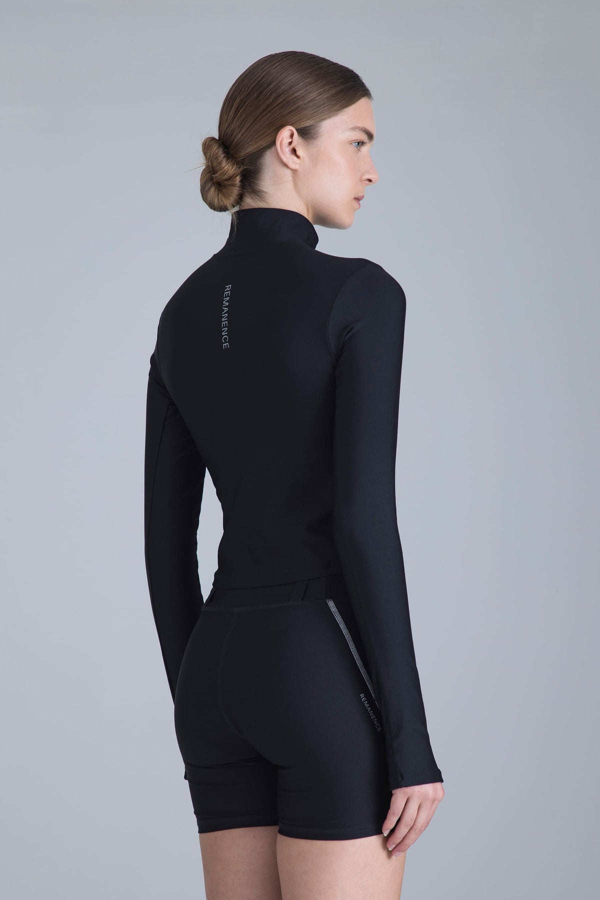 Midlayer negro para mujer slim fit Helix