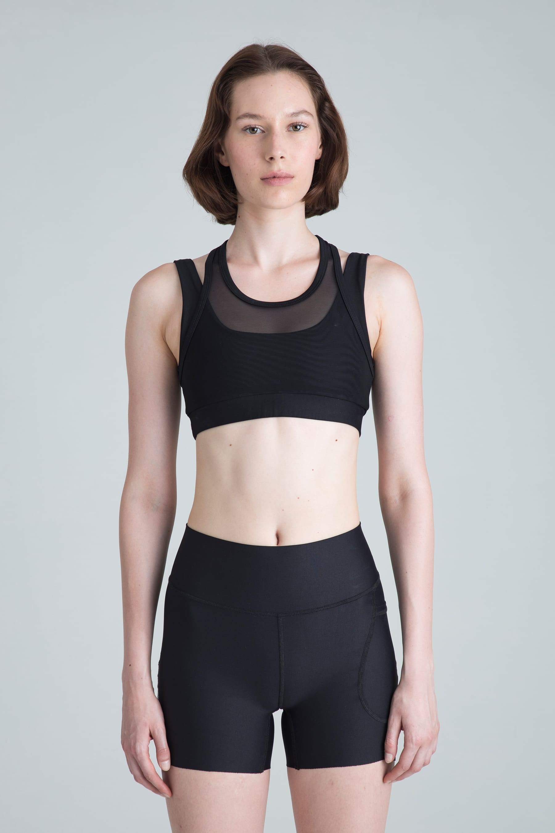 Top deportivo negro para mujer Apex soporte medio en modelo