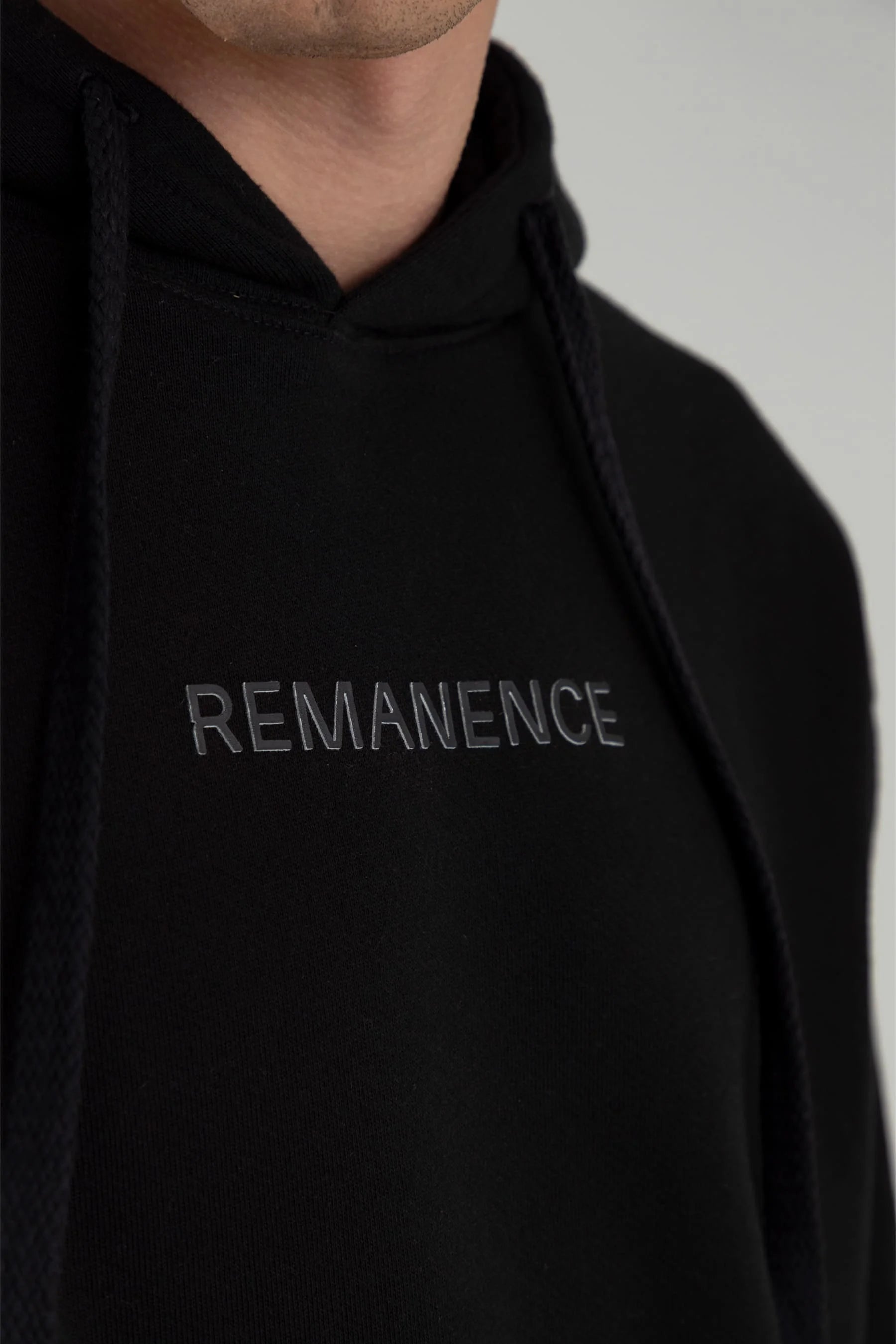 Buzo negro capucha hombre Hoodie Remanence 