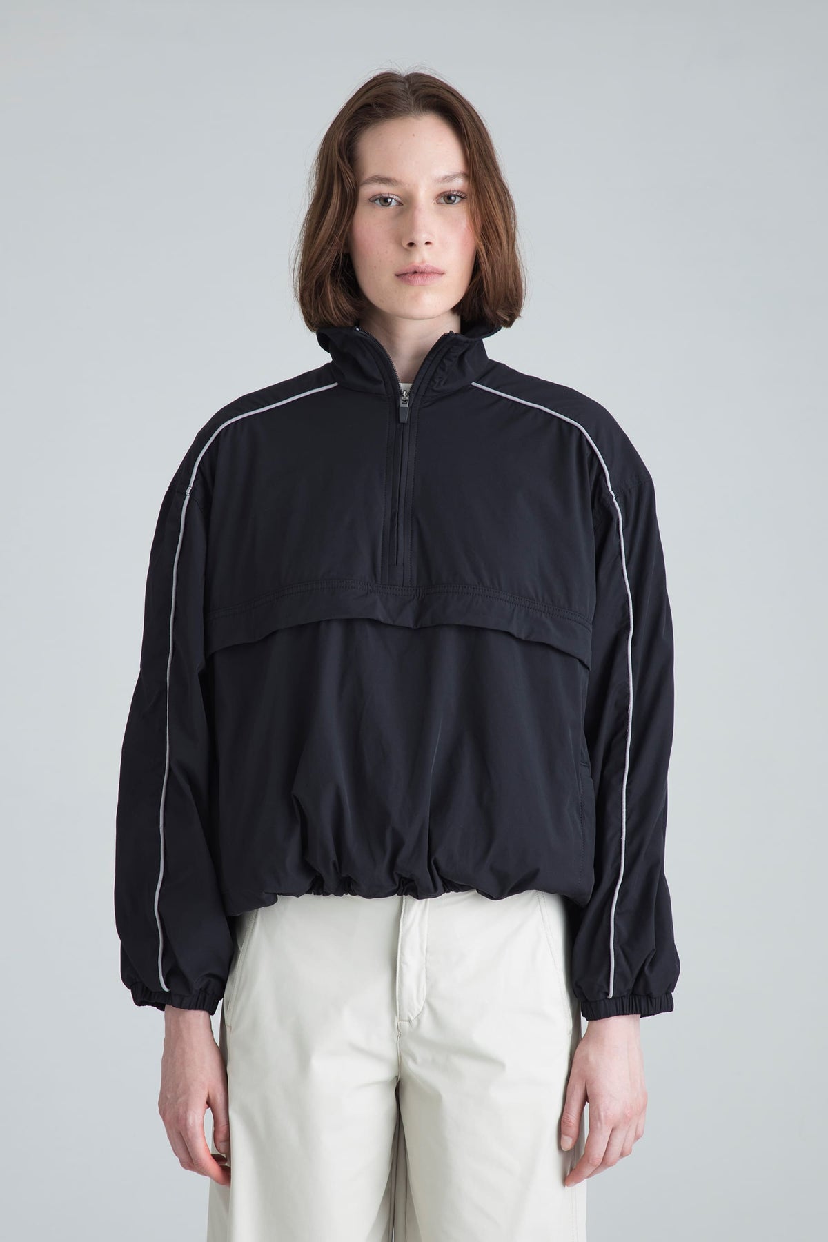 Chaqueta cuello alto con media cremallera para mujer Shade