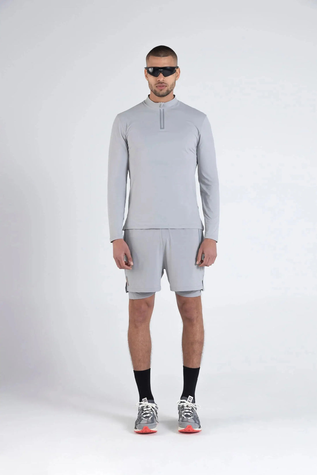 Camiseta gris deportiva manga larga cuello con cierre slim fit Dew