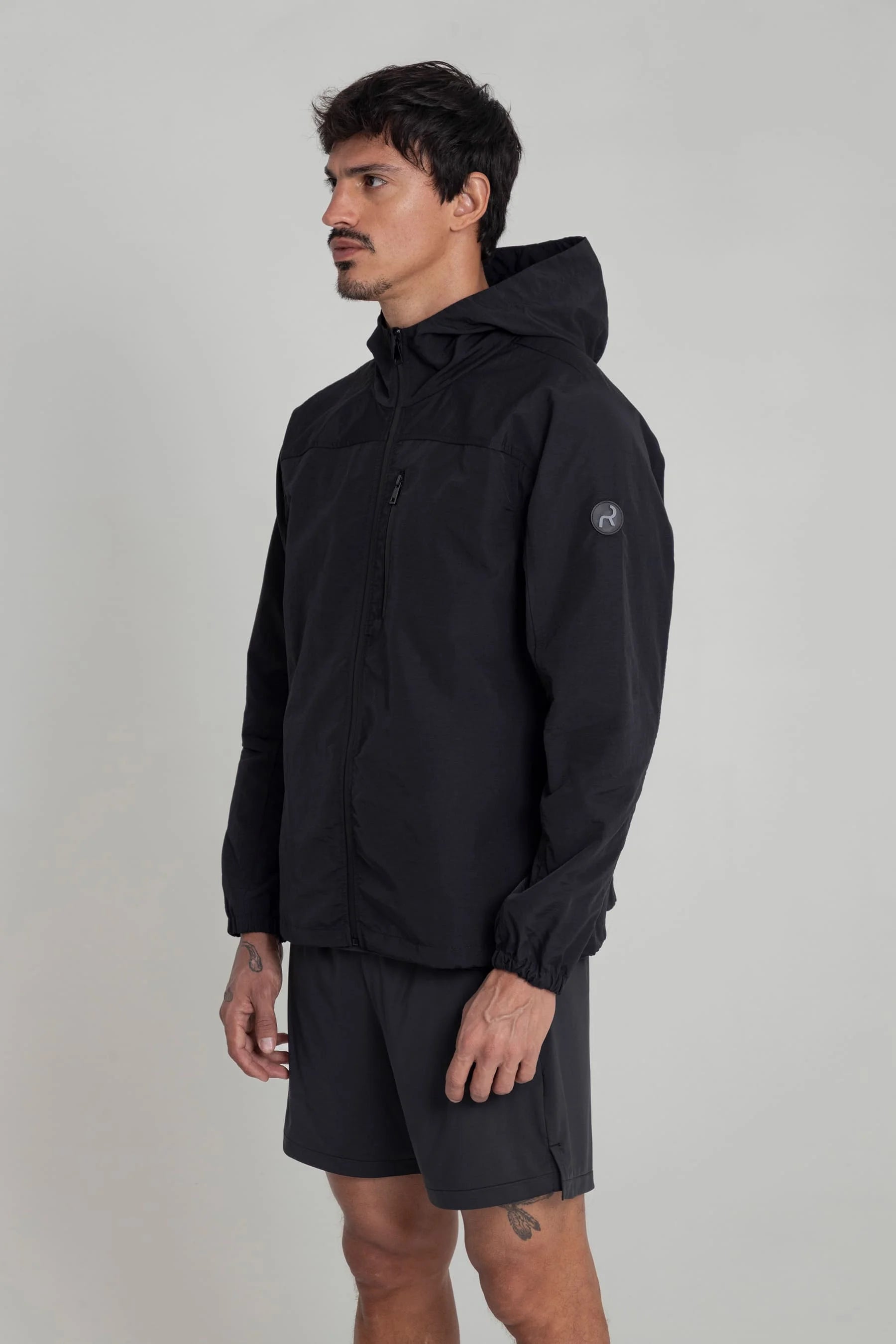 Chaqueta running negra para hombre Remanence 