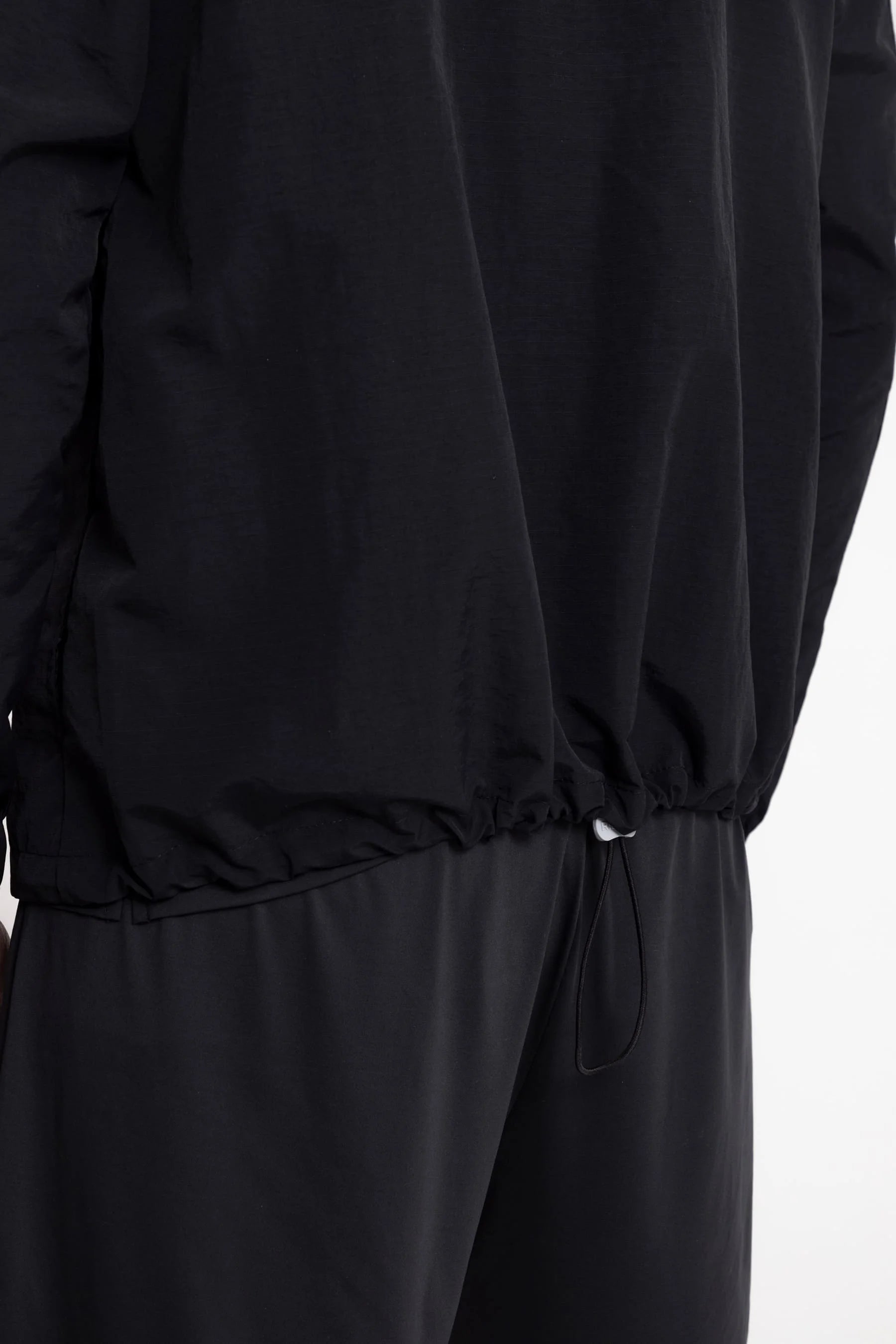 Chaqueta running negra para hombre Remanence 