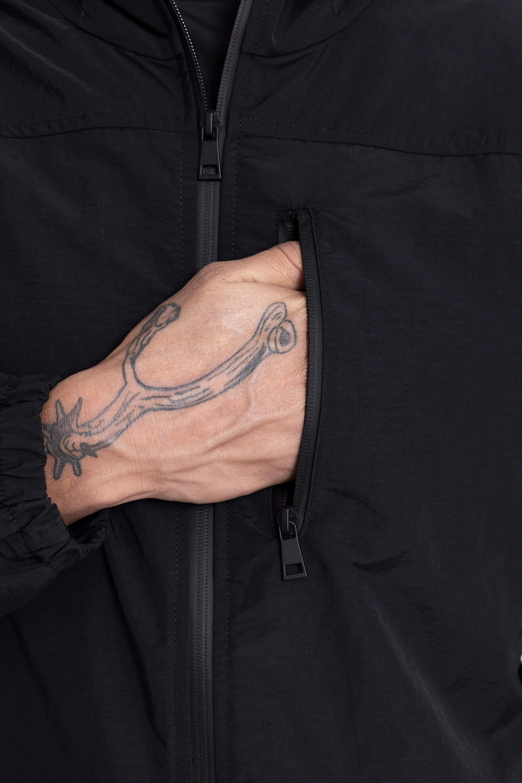 Chaqueta running negra para hombre Remanence 