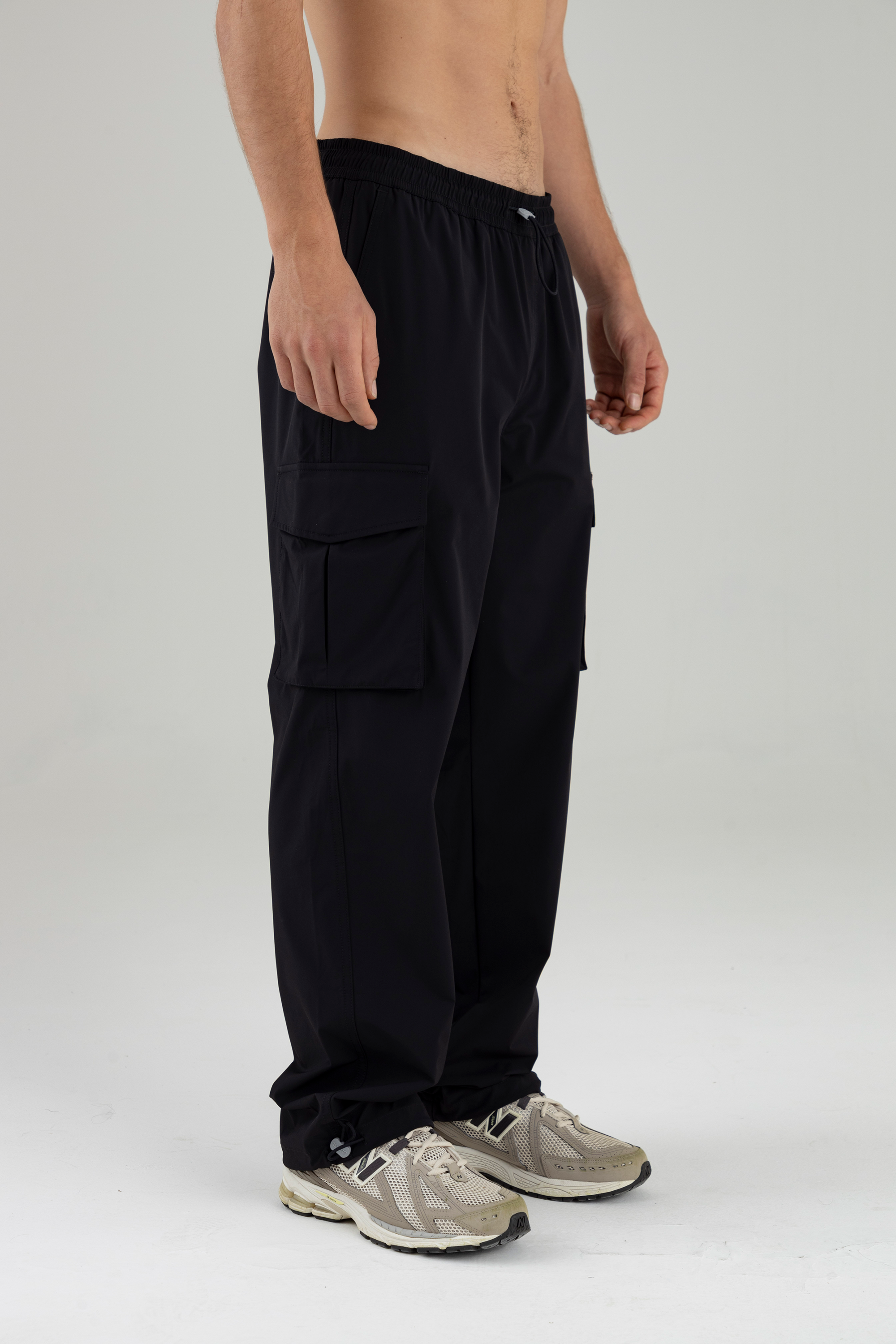 A Los Lados Pantalon Negro Bolsillos Laterales Pantalon Con Bolsas