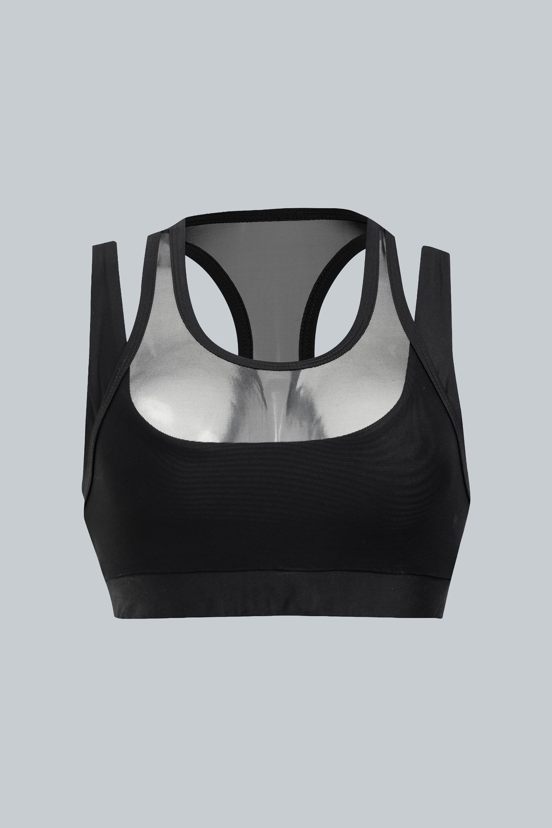 Top deportivo negro para mujer Apex vista frontal con dual mesh