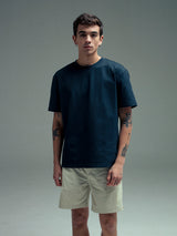 T shirt azul relaxed fit con algodón de alto gramaje, costuras resistentes y silueta amplia para uso urbano